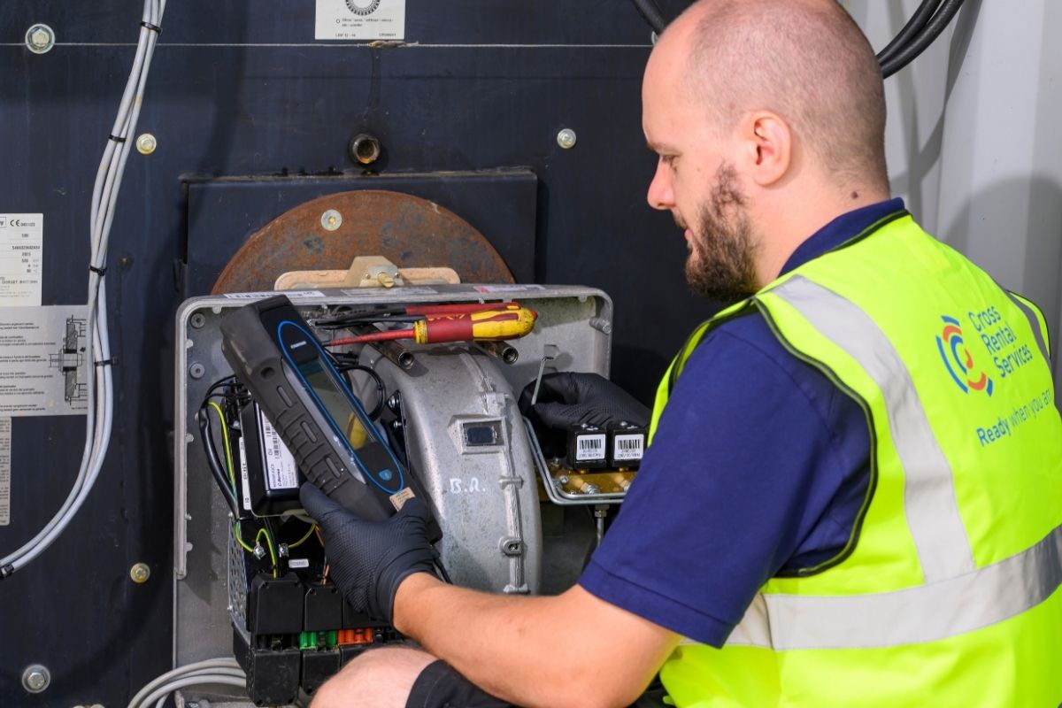 CRS engineer connecting a packaged chiller