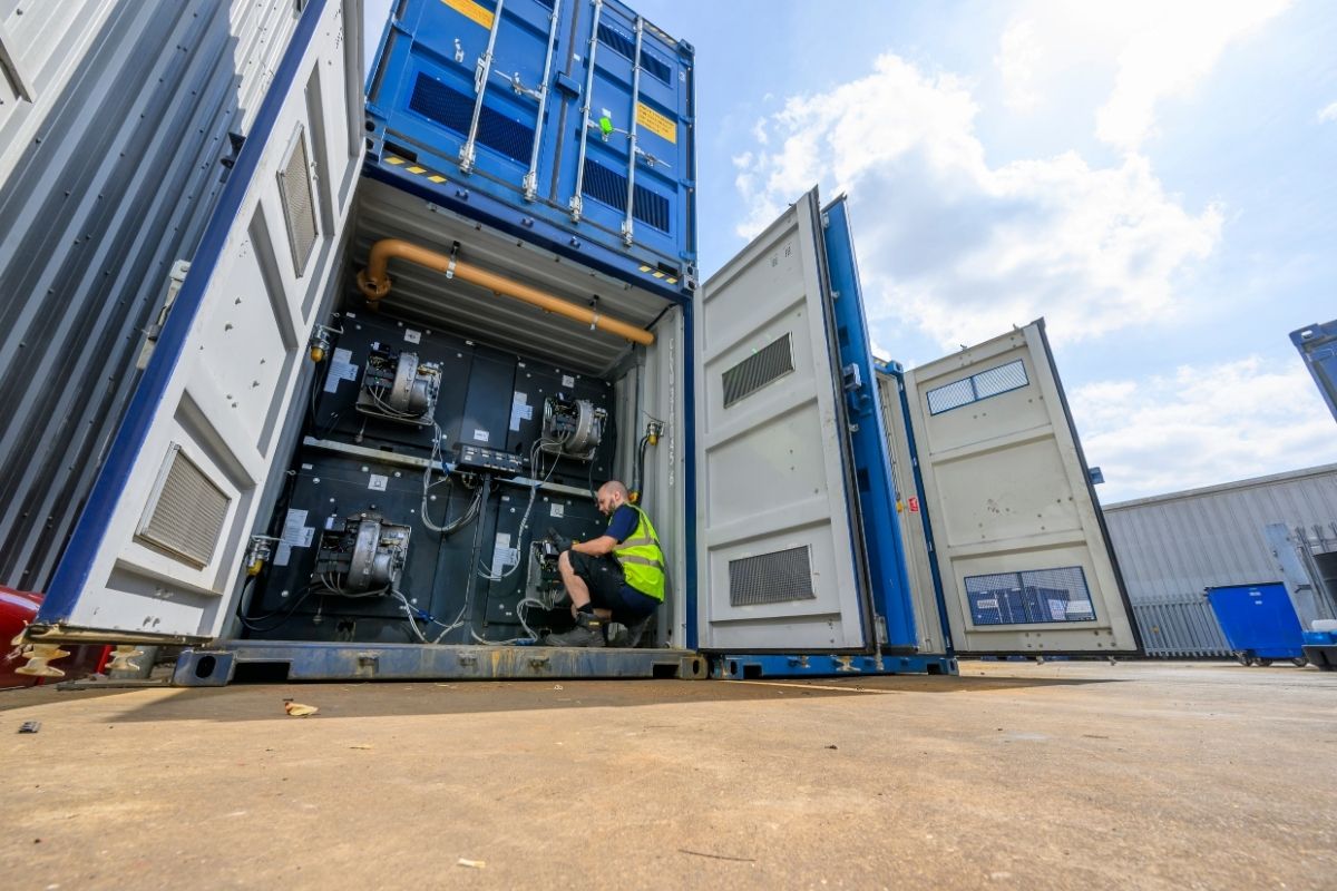 CRS engineer working inside containerised boiler