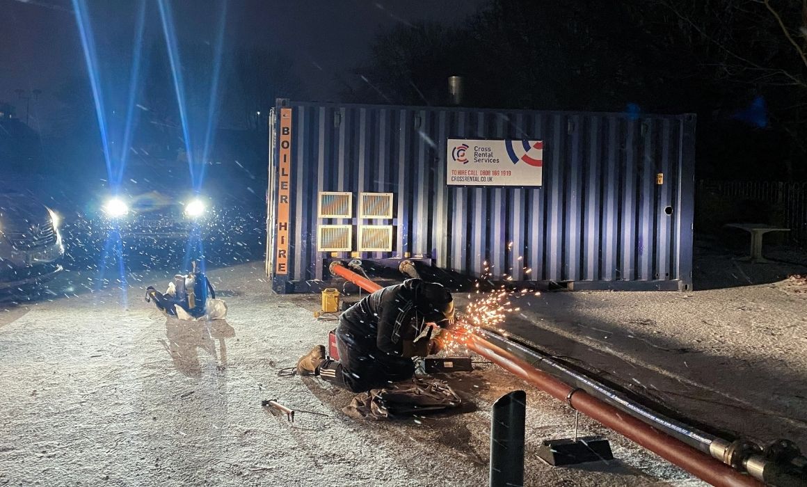 CRS engineer welding pipes in the snow
