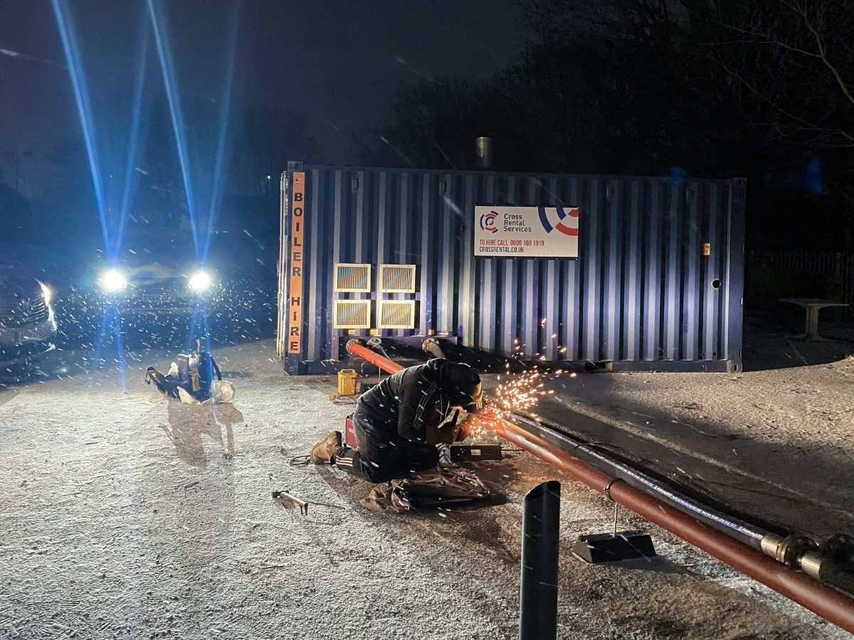 CRS engineer welding pipes in the snow