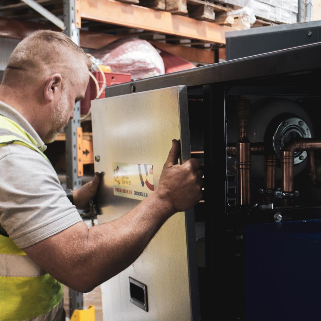 CRS engineer connecting a packaged chiller