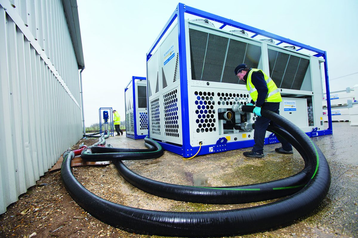 CRS engineer connecting a packaged chiller